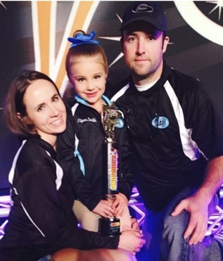 Tiffany Smith with her partner and their daughter.